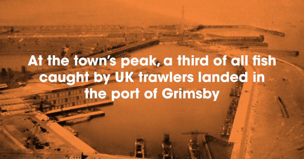 At the town's peak, a third of all fish caught by UK travelers landed in the port of Grimsby. Photo: Town of Grimsby overlooking the port.